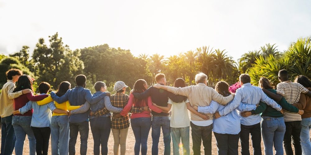 Group,Of,Multigenerational,People,Hugging,Each,Others,-,Support,,Multiracial