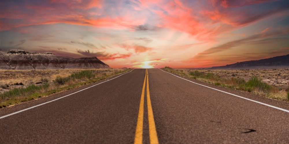 Sunset,At,The,End,Of,The,Road,In,The,Desert