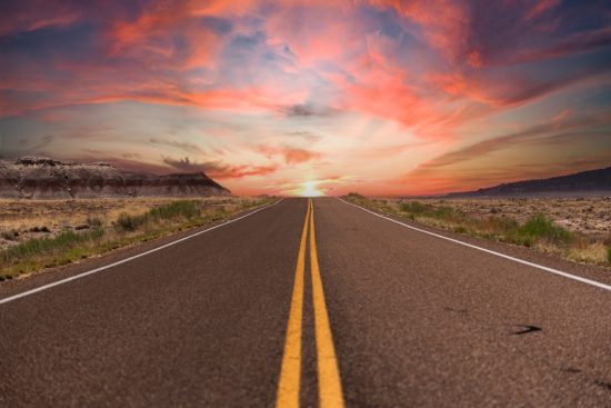 Sunset,At,The,End,Of,The,Road,In,The,Desert
