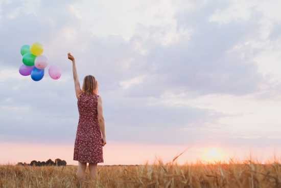 Hope,Concept,,Emotions,And,Feelings,,Woman,With,Colorful,Balloons,In